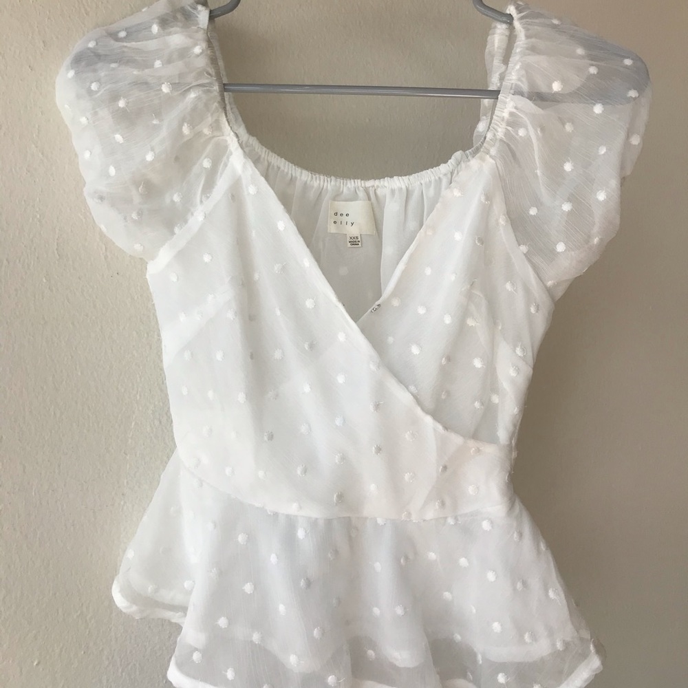Francesca’s brand new sheer white top